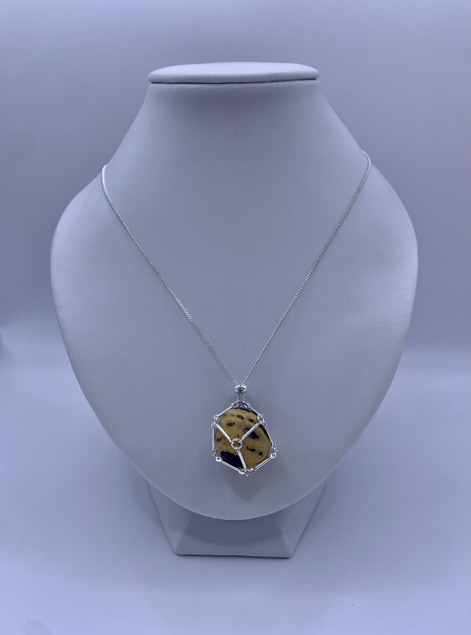 Chaîne en acier porte pierre roulée - shop_name Lithothérapie