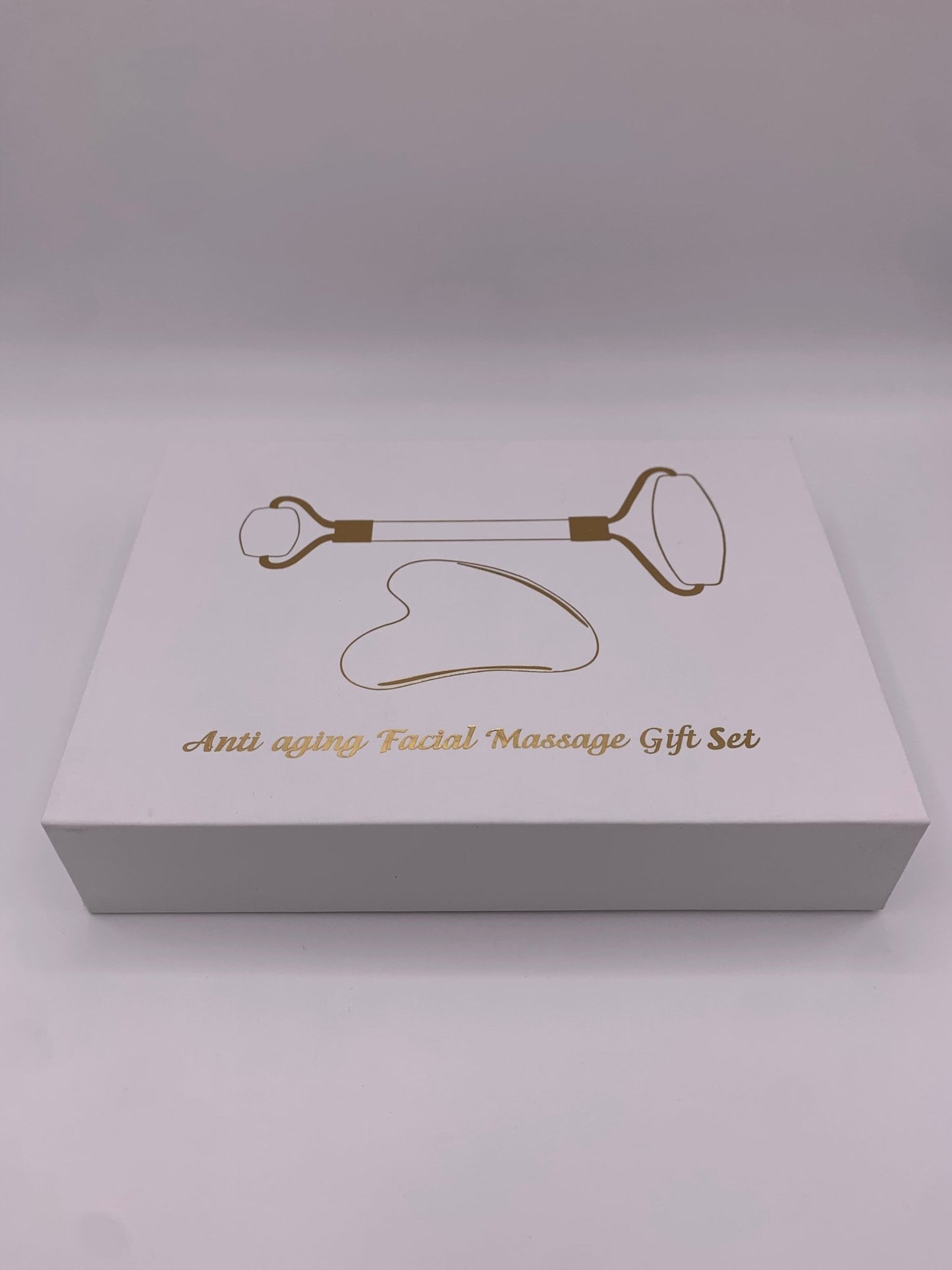 Coffret rouleau de massage et gua sha en serpentine - shop_name Lithothérapie