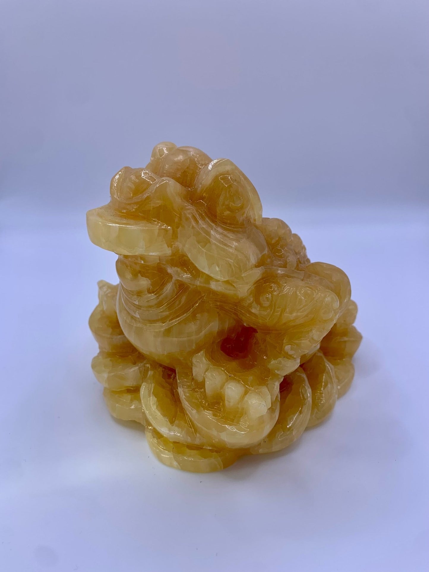 Grenouille en calcite orange grand modèle - shop_name Lithothérapie