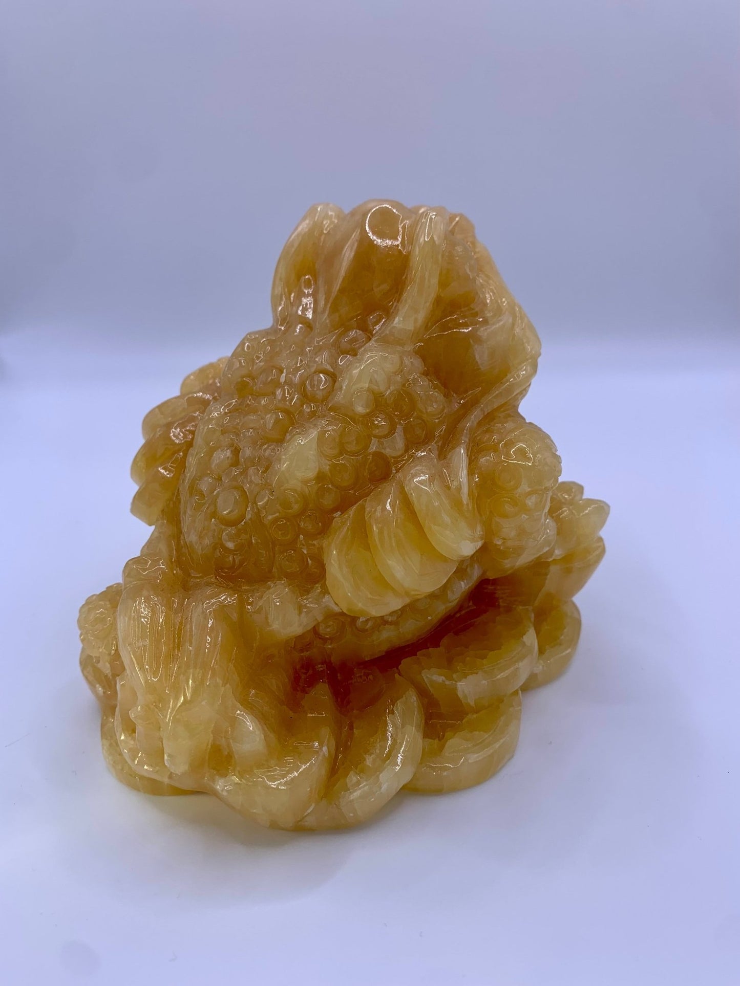 Grenouille en calcite orange grand modèle - shop_name Lithothérapie