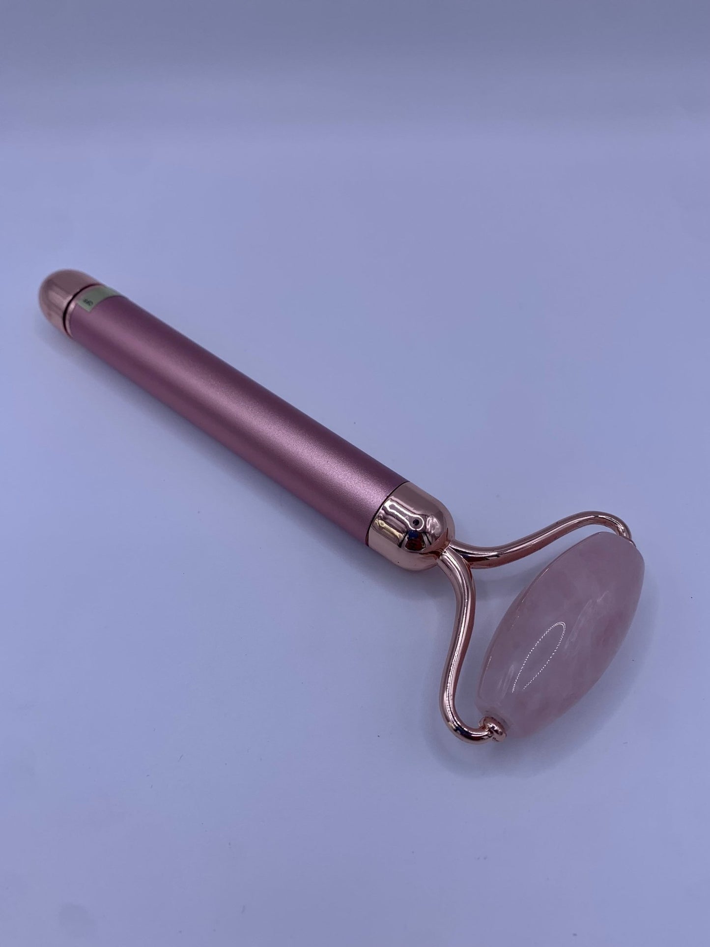 Rouleau de massage vibrant en quartz rose - shop_name Lithothérapie
