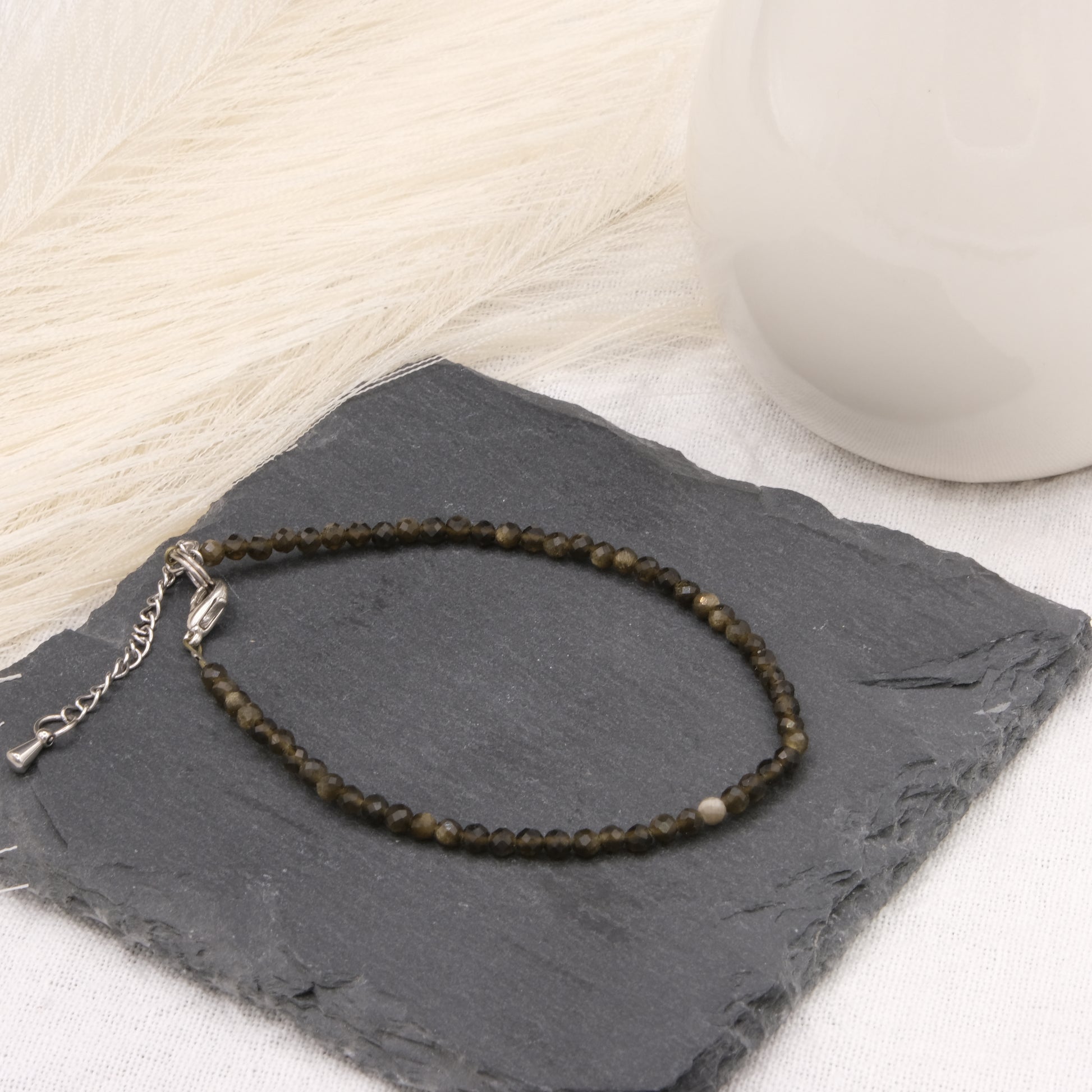 Bracelet Obsidienne dorée 3mm facetté-Terre de Cristal